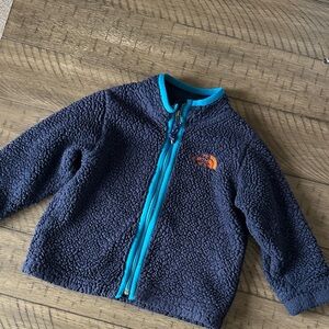 The North Face Dark Blue Fleece Jacket with Teal and Orange Accents